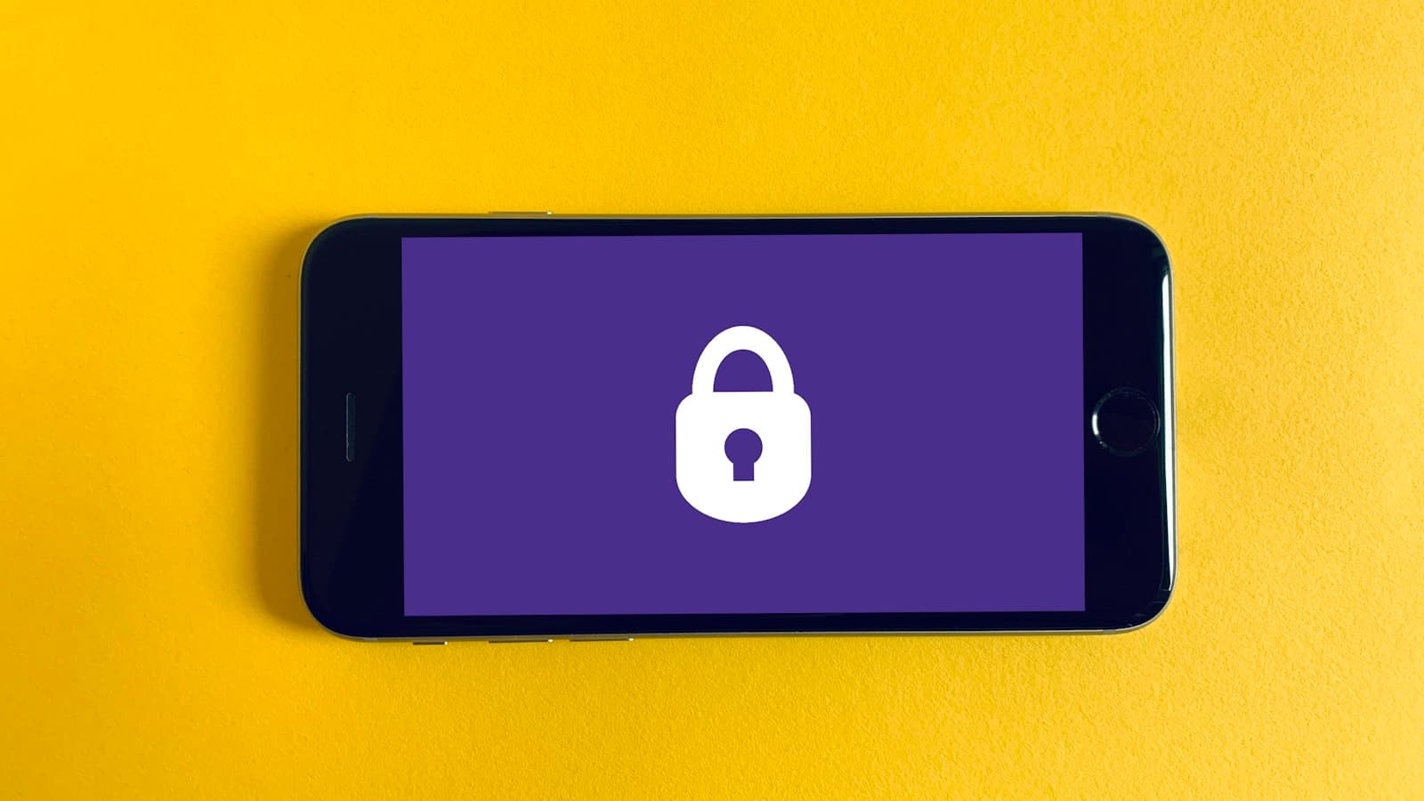 A padlock icon on a smartphone screen, representing account security